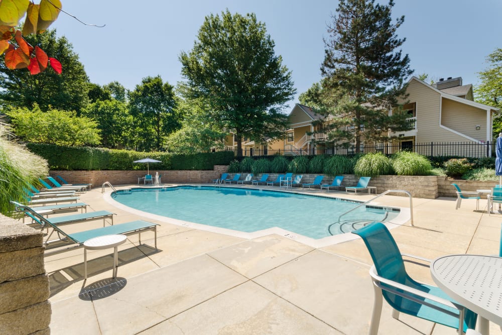 Pool and deck chairs at Eagle Rock Apartments at Columbia in Columbia, Maryland