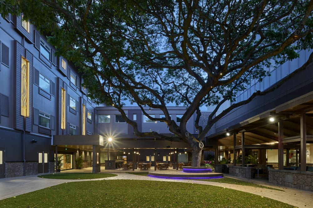 Exterior of building with courtyard at Hale O Meleana in Honolulu, Hawaii