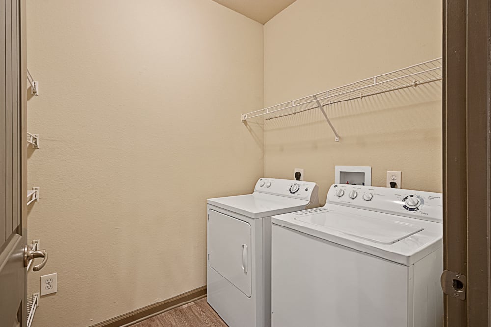 Laundry room at The Addison at South Tryon in Charlotte, North Carolina