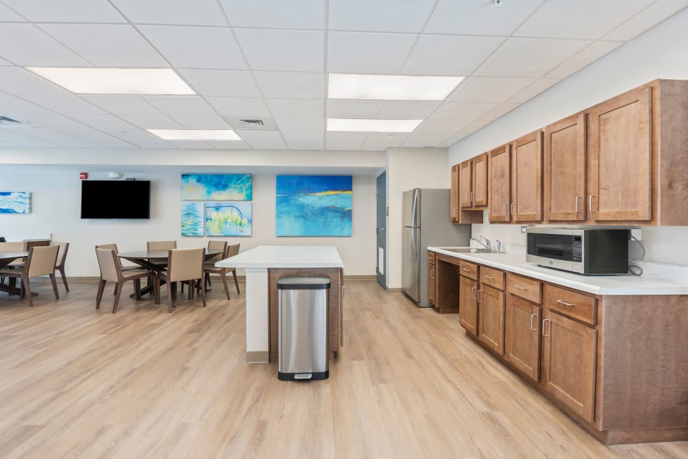 Lots of cabinets in a kitchen at The Apartments at Sharpe Square in Frederick, Maryland