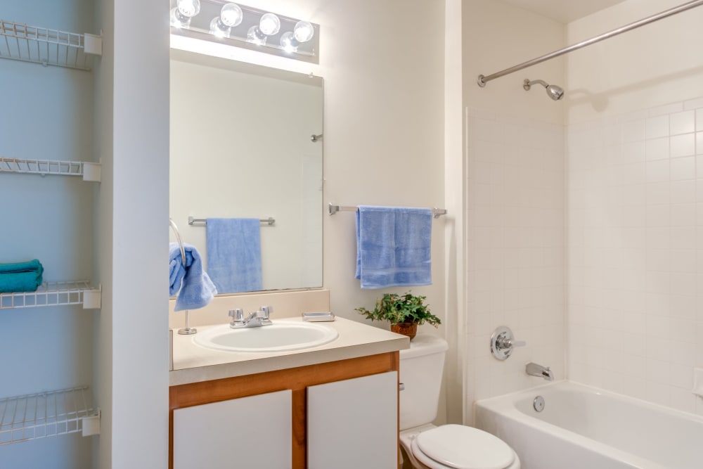 A bathroom with plenty of storage space at The Vinings at Christiana in Newark, Delaware