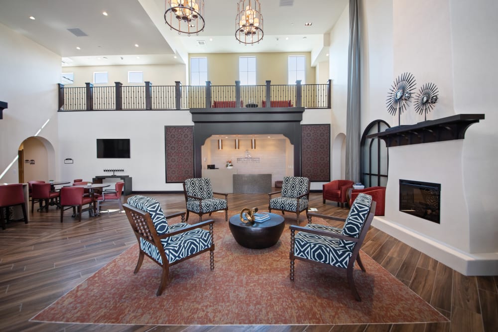 Main lobby with a fireplace and large reception area at Regency Palms Oxnard in Oxnard, California