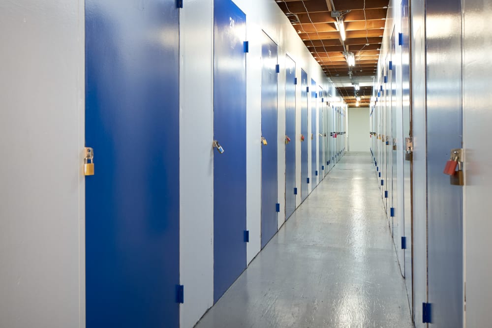 Indoor storage hallway at Stor'em Self Storage in San Diego, California