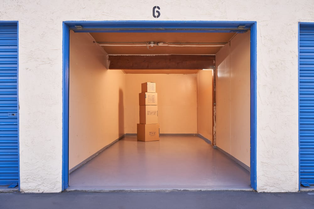 Drive up units open door at Stor'em Self Storage in San Diego, California