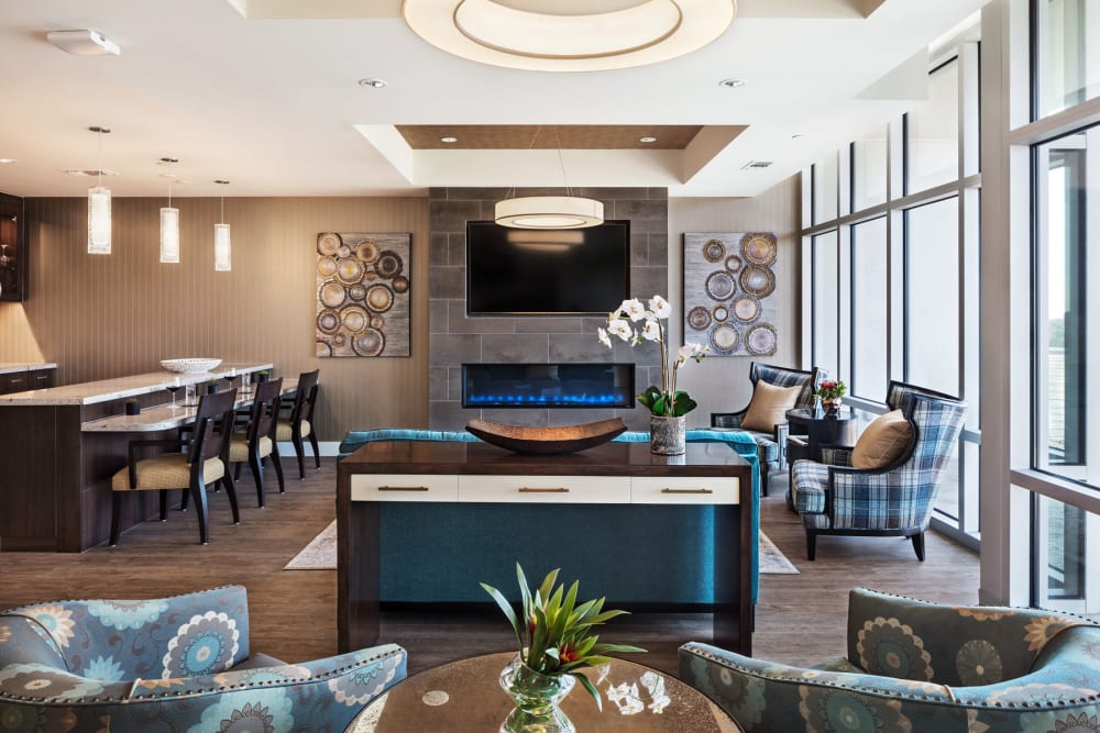seating lounge with bar and fireplace