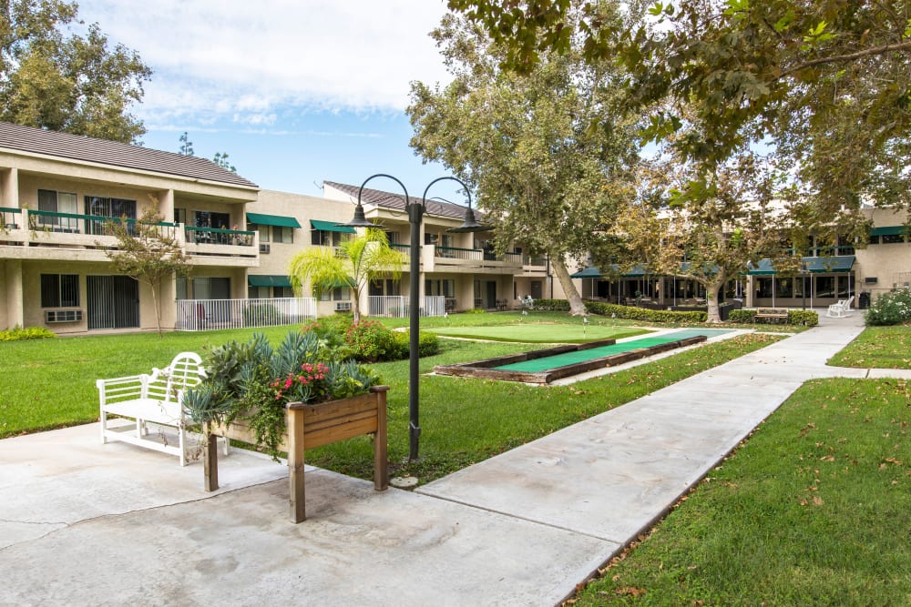 Courtyard with walking paths to various ends of the community at Citrus Place in Riverside, California