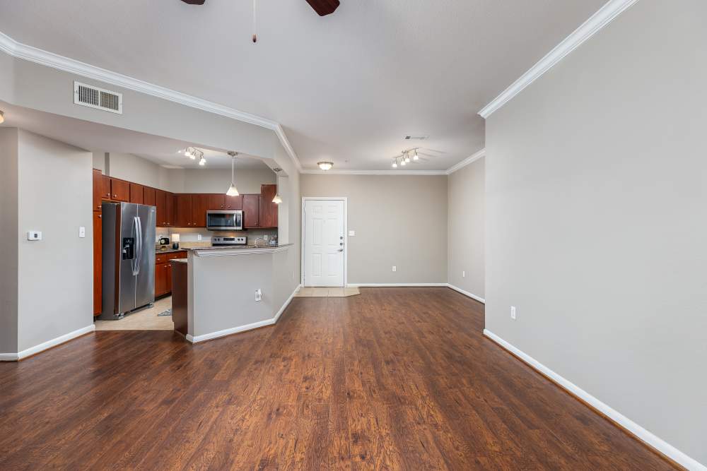 Spacious living rooms at The Abbey at Grande Oaks in San Antonio, Texas