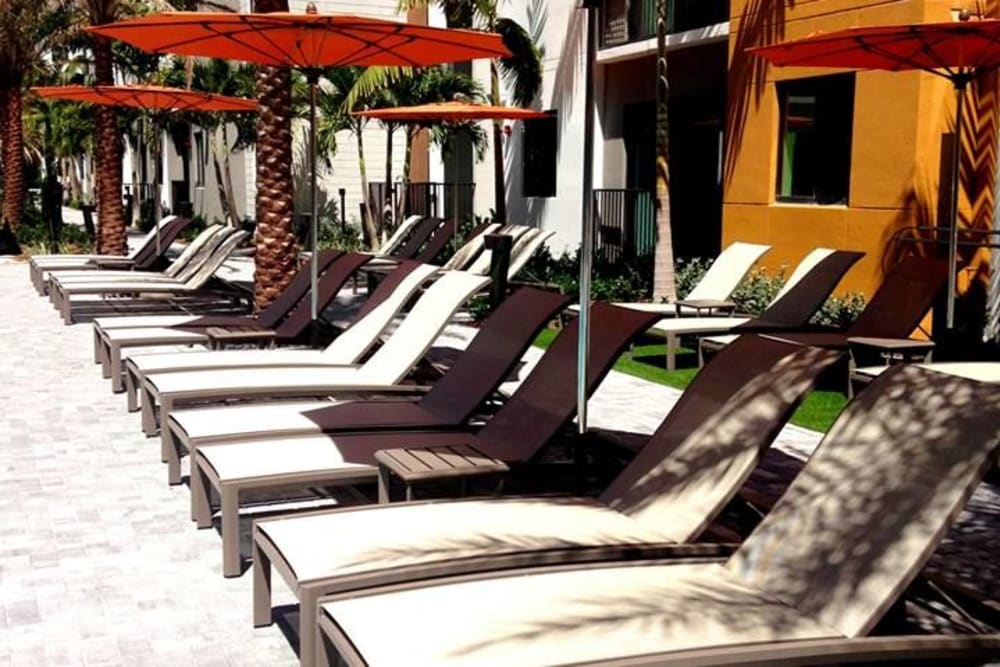 Lounge next to the luxurious pool at University Park in Boca Raton, Florida