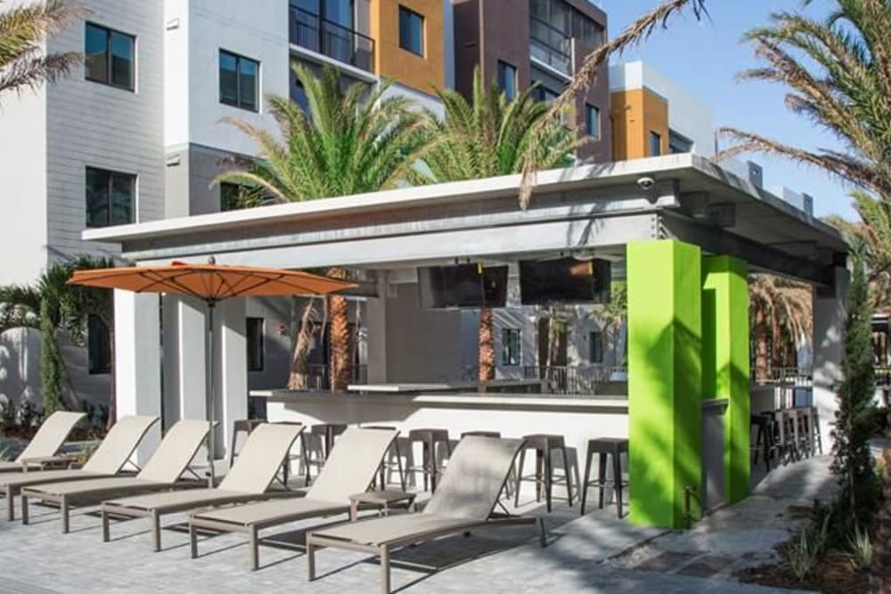 Outside lounge area next to the pool for plenty of residents to gather at University Park in Boca Raton, Florida
