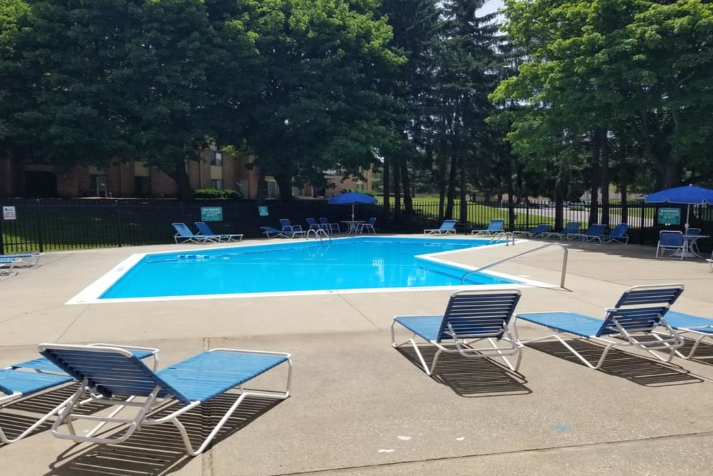 Swimming pool at Arbors of Battle Creek Apartments & Townhomes in Battle Creek, Michigan