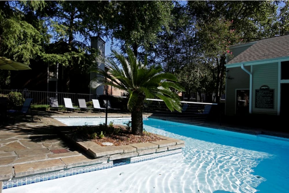 Swimming pool at Peppertree Apartment Homes in Lafayette, Louisiana