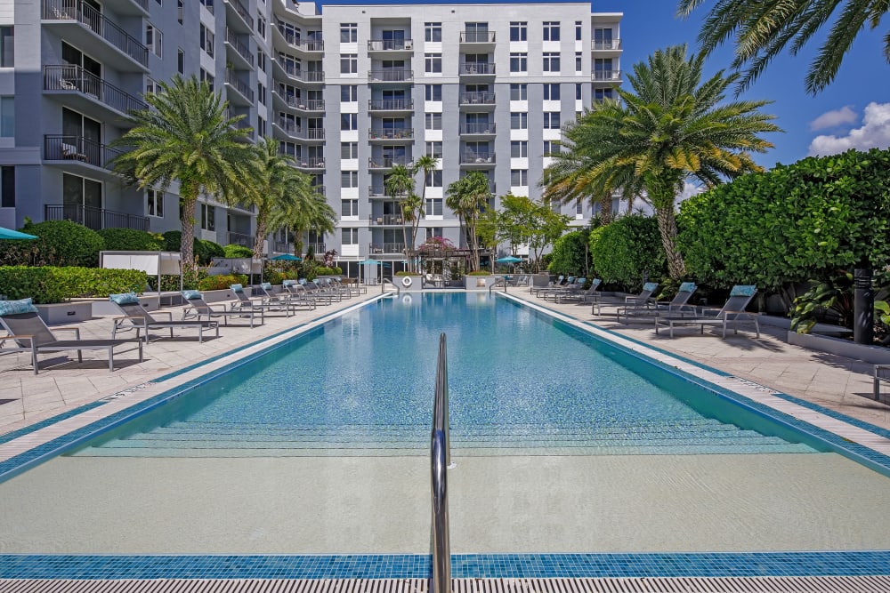 Beach-style entry swimming pool at American Landmark's Midtown 24 luxury community