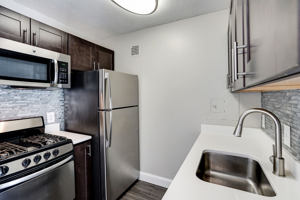 Gorgeous clean kitchen ready for move in at The Cambridge Apartments in Washington, District of Columbia