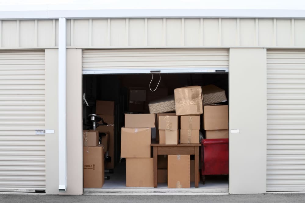 Storage unit filled with plenty of moving boxes at KO Storage in Brainerd, Minnesota. 