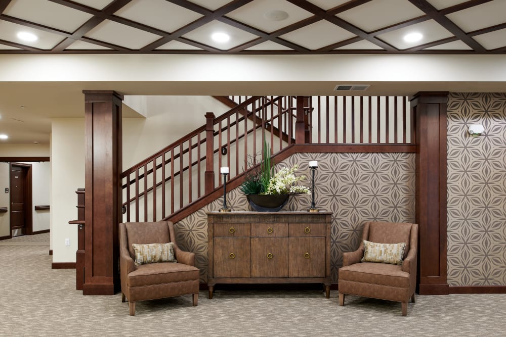 View of a large staircase and chairs at Willows Landing in Monticello, Minnesota