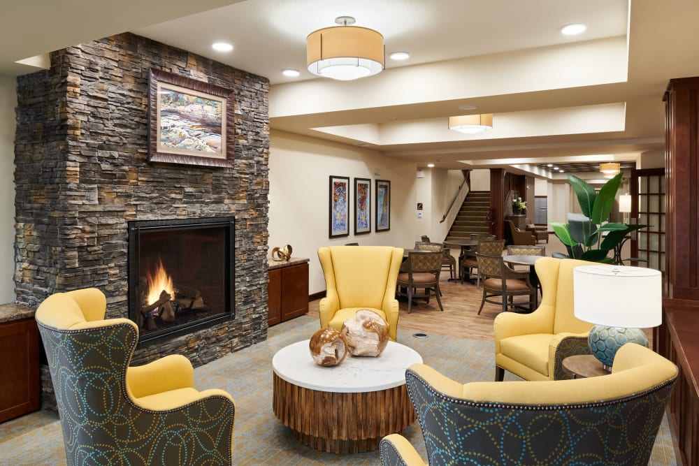 Beautiful lounge area with fireplace at Willows Landing in Monticello, Minnesota