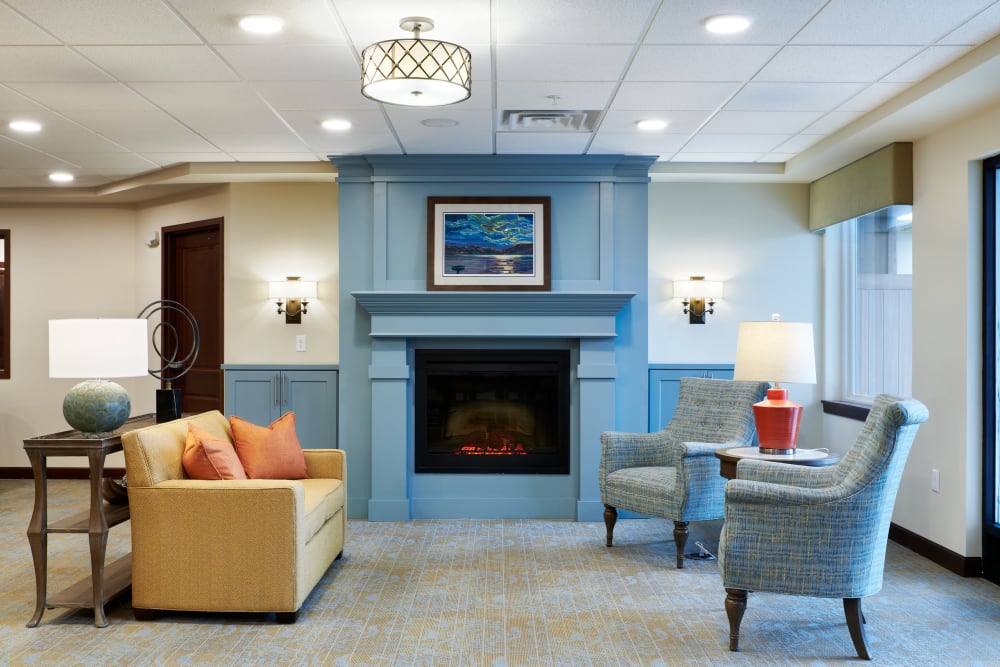 Lounge with fireplace at Willows Landing in Monticello, Minnesota