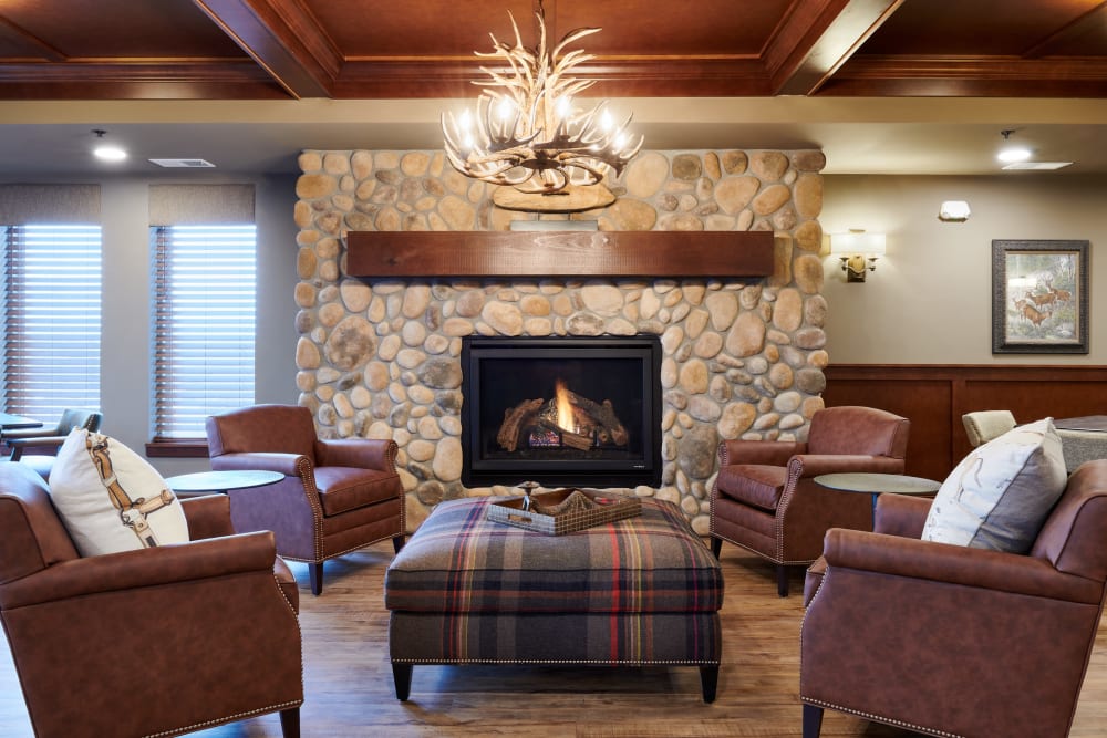 Chairs and fireplace at Willows Landing in Monticello, Minnesota