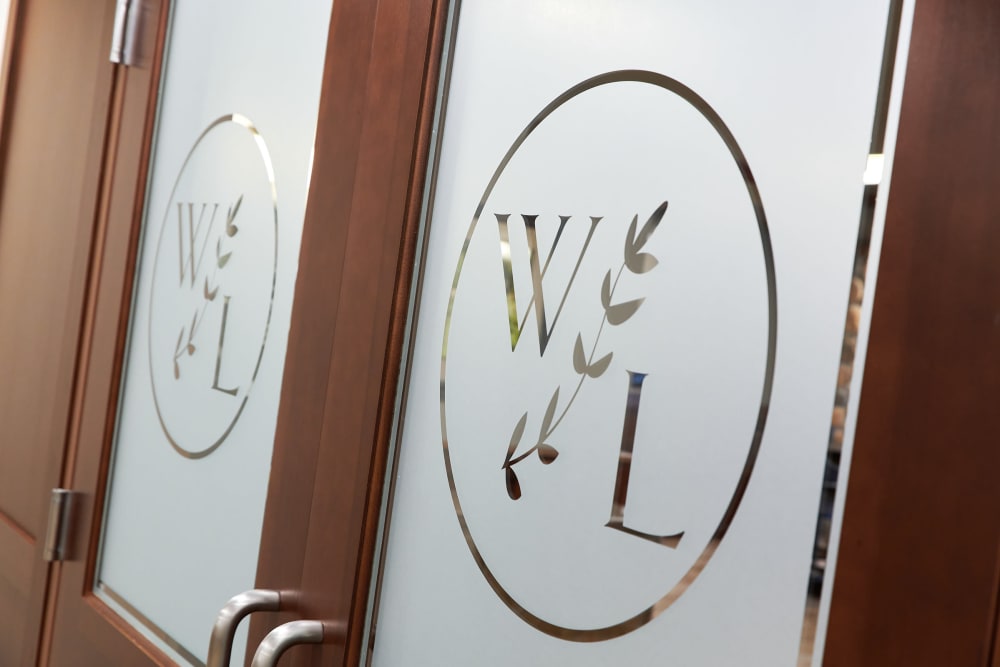 Company logo on doors at Willows Landing in Monticello, Minnesota