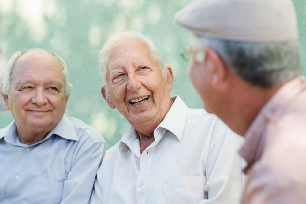 Friends hanging out enjoying the nice whether near Leisure Manor Apartments in Sacramento, California