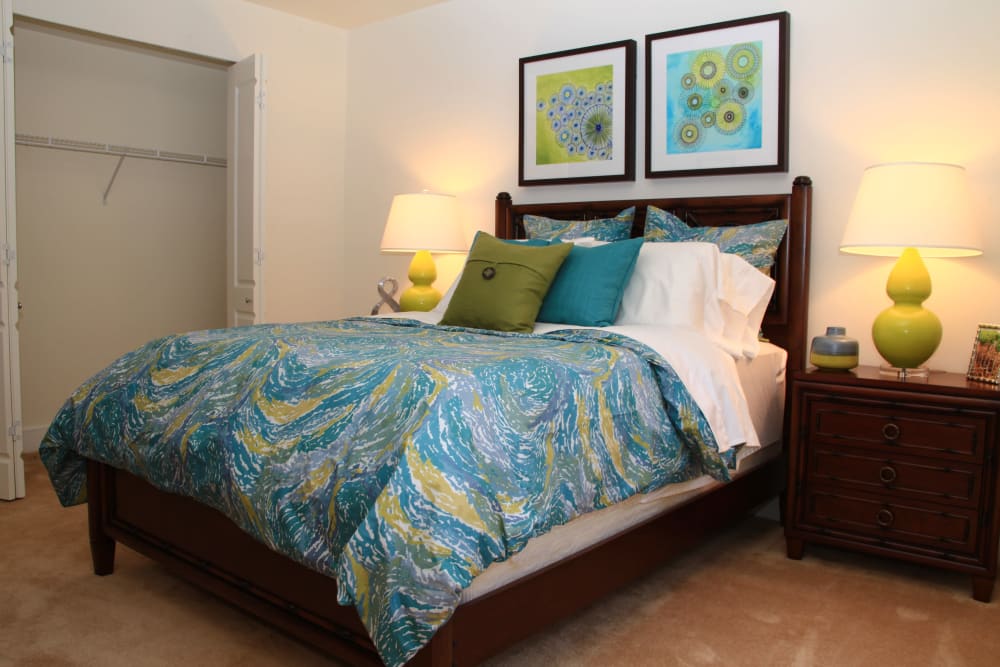 Bedroom with a large walk-in closet at The Heritage at Boca Raton in Boca Raton, Florida