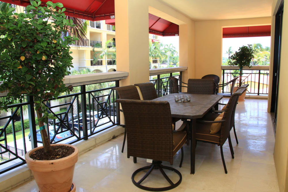 Outdoor, poolside patio at The Heritage at Boca Raton in Boca Raton, Florida