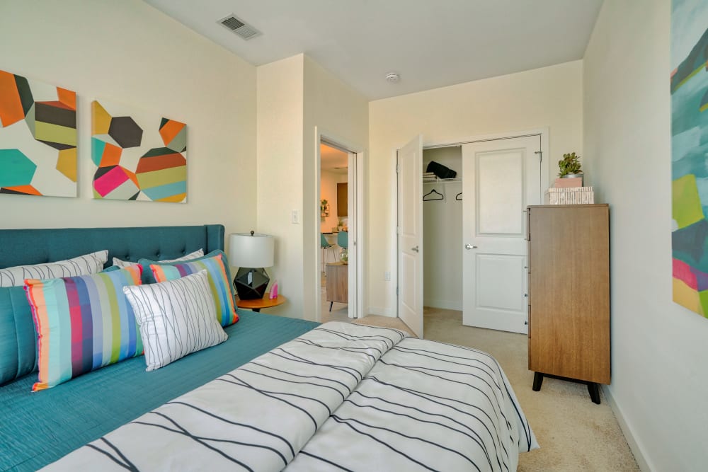 Bedroom with walk-in closet at Indigo 19 in Virginia Beach, Virginia