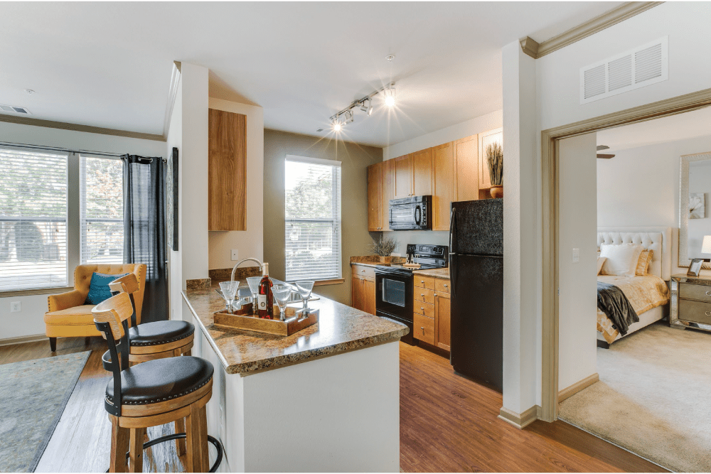 Decorated kitchen with breakfast bar and tons of counter space at Summerfield at Morgan Metro in Landover, Maryland