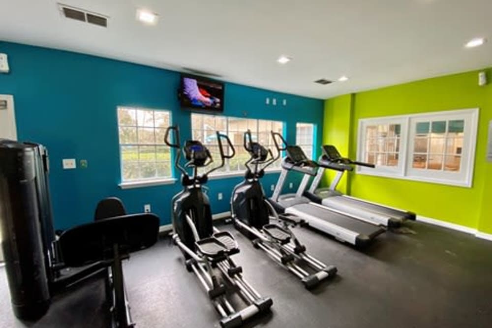 Well-equipped fitness center with terrific view of the community at 1801 MetroWest in Orlando, Florida