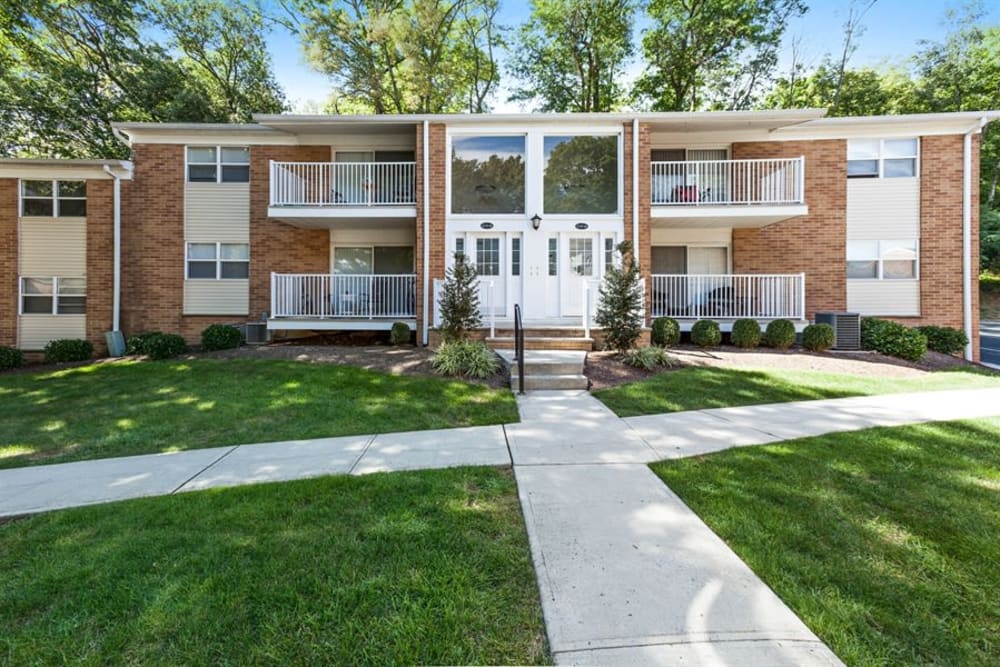 Exterior photo of the walkway and courtyard leading up to the entrance of Eagle Rock Apartments at North Plainfield in North Plainfield, New Jersey