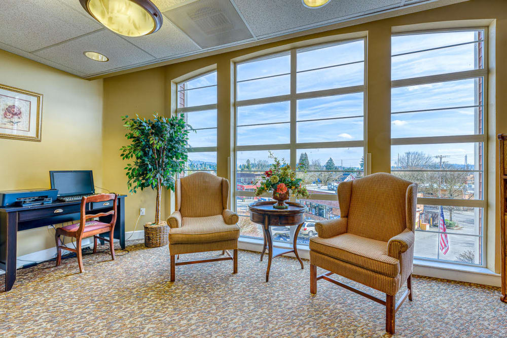 Cozy seating area with a view at Sellwood Senior Living in Portland, Oregon. 