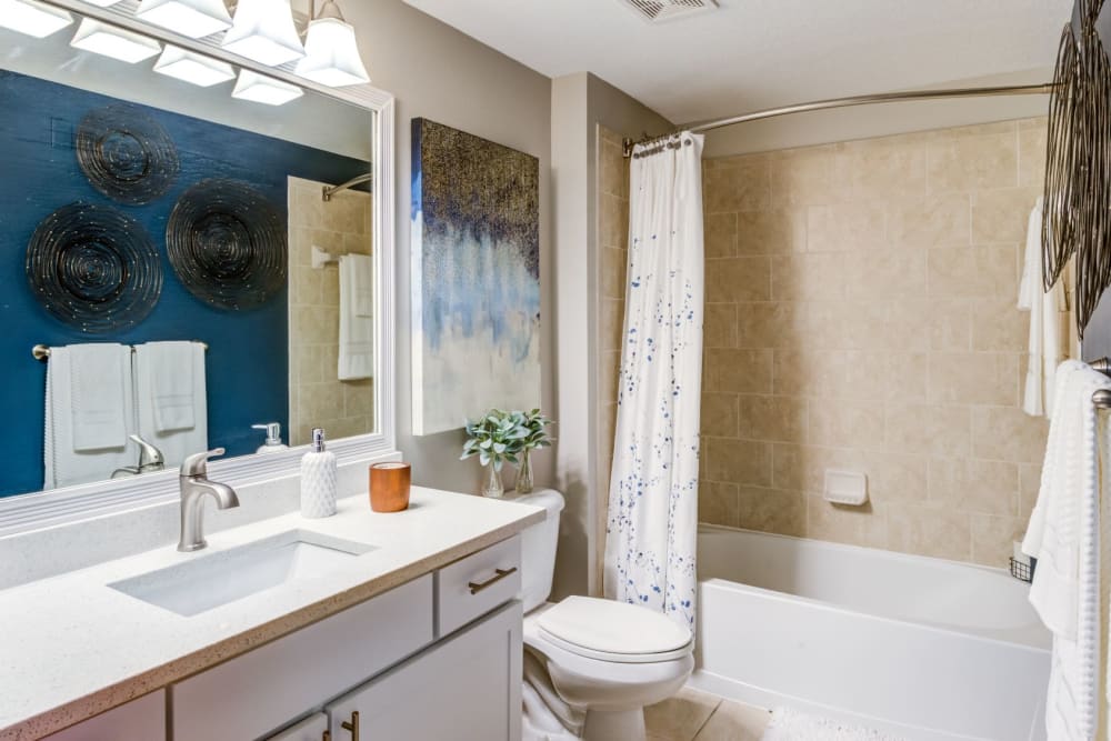 Nice bathroom with shower and large vanity mirror at The Pearl in Ft Lauderdale, Florida