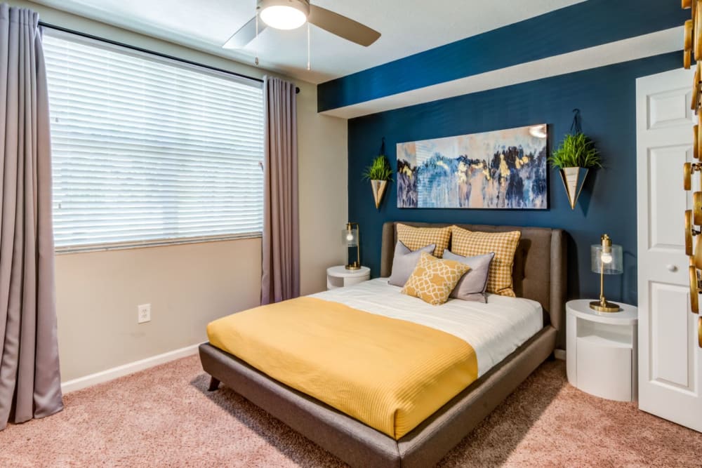 Bedroom with carpet and huge windows giving tons of natural light at The Pearl in Ft Lauderdale, Florida