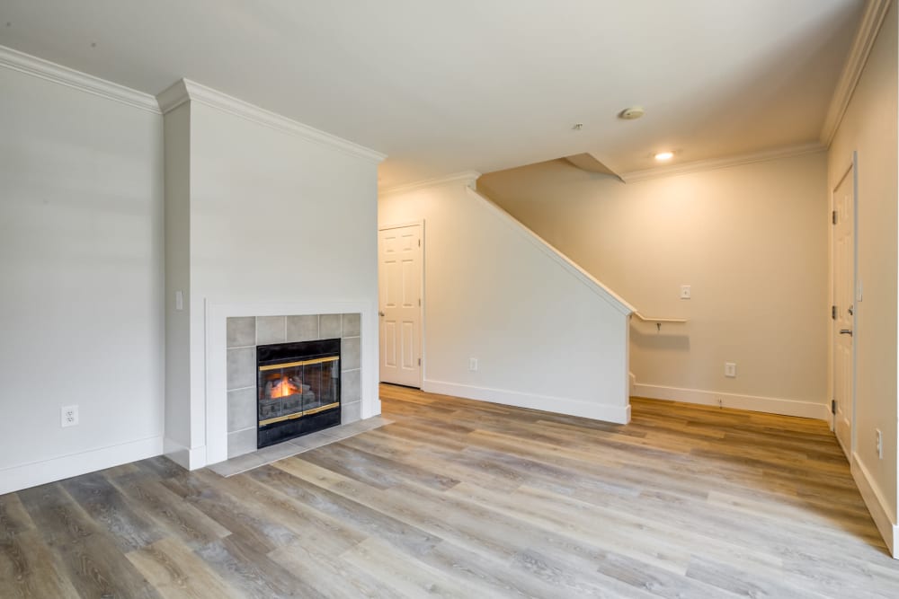 Living room with fireplace at Sofi at Salem Station in Salem, MA