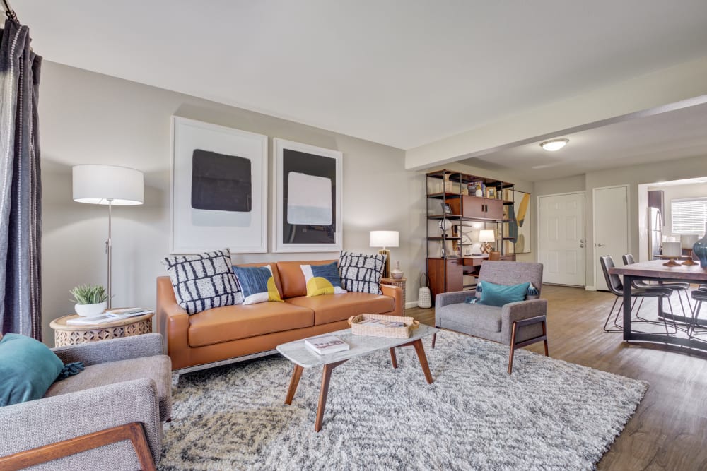  Living room with decorative rug and stylish furniture at Sofi Waterford Park in San Jose, California
