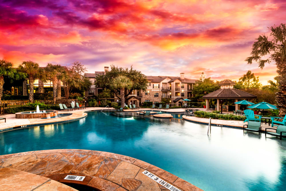 Resort-style, sparkling swimming pool at Marquis Parkside in Austin, Texas