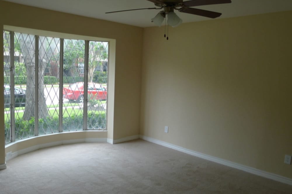 Open bedroom ready for move in with huge windows for tons of natural light at 10501 Holly Springs in Houston, Texas