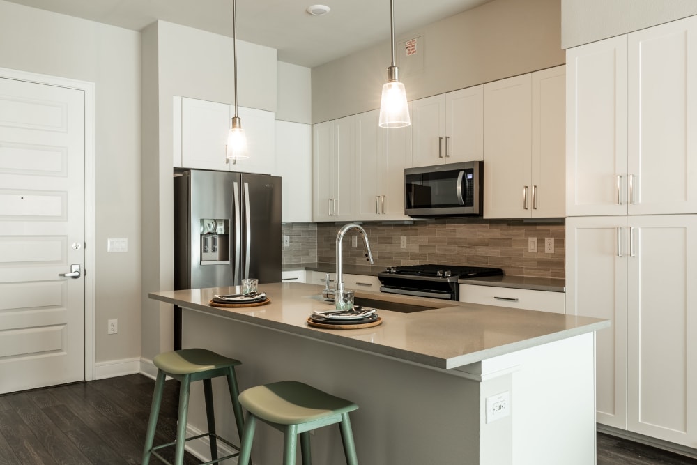 Kitchen with stainless steel appliances at The Clark in Austin, Texas