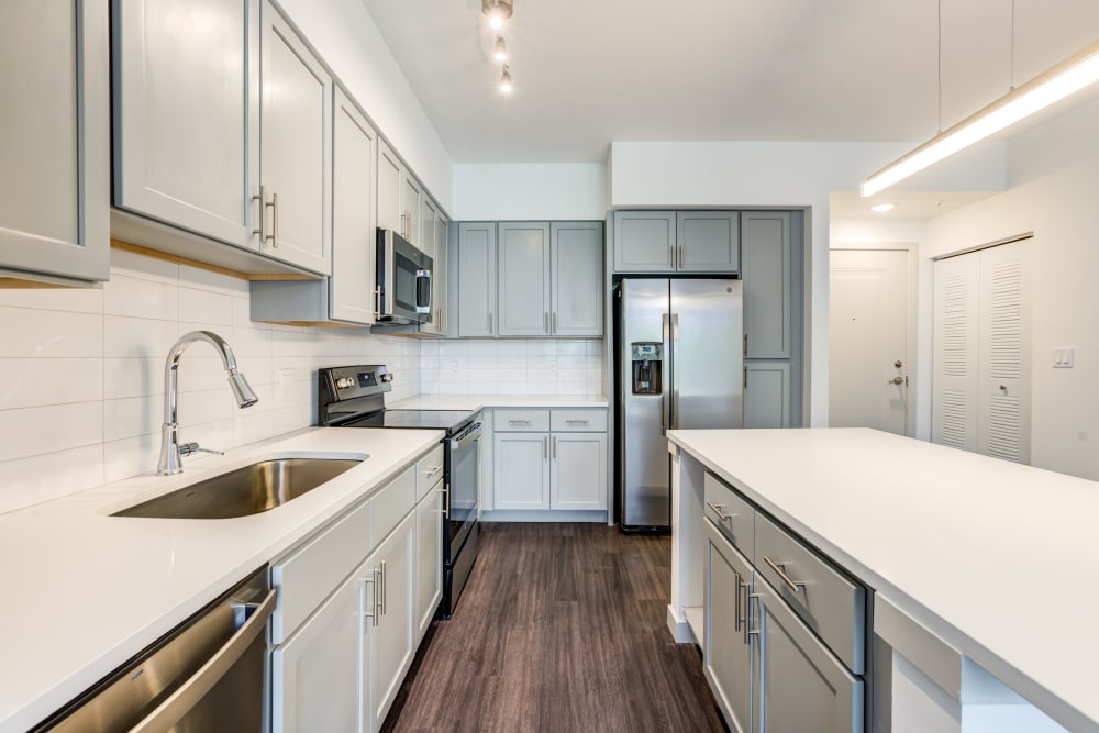 Kitchen with quartz countertops at Solera at City Centre in Palm Beach Gardens, Florida