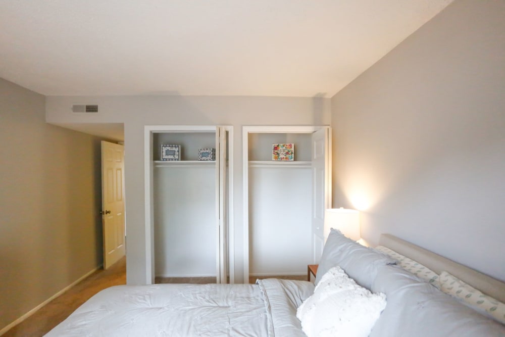Bedroom with tons of closet space ready for move in at The Flats at Arrowood in Charlotte, North Carolina