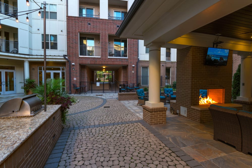 Courtyard patio with fireplace at 401 Oberlin in Raleigh, North Carolina
