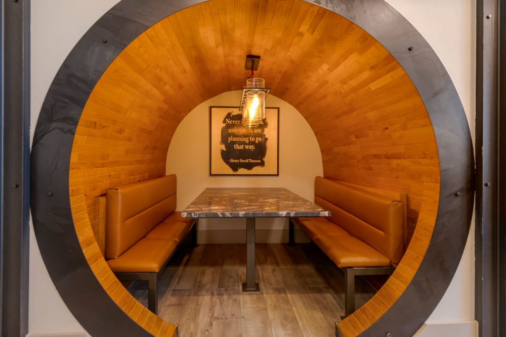 Cozy wood tunnel seating at The Guthrie in Austin, Texas