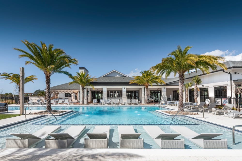 A luxury swimming pool at Olympus Emerald Coast in Destin, Florida