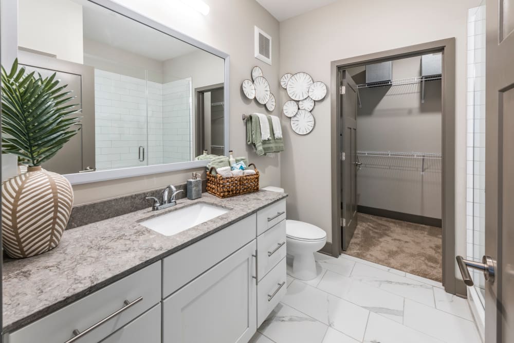 A large bathroom vanity with plenty of storage at Olympus Emerald Coast in Destin, Florida