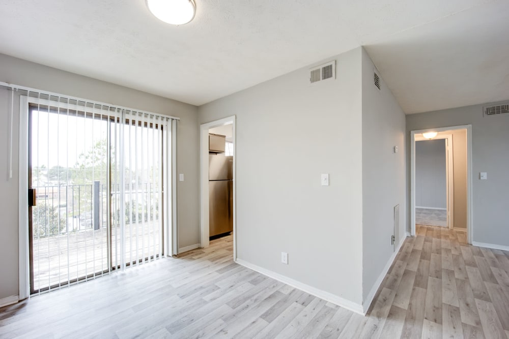 Sliding doors leading to the private balcony outside an apartment at Sedgefield in Marietta, Georgia