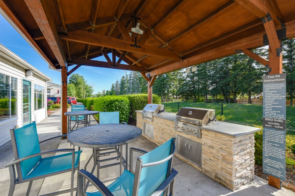 The outdoor covered barbecue area at The Landings at Morrison Apartments in Gresham, Oregon