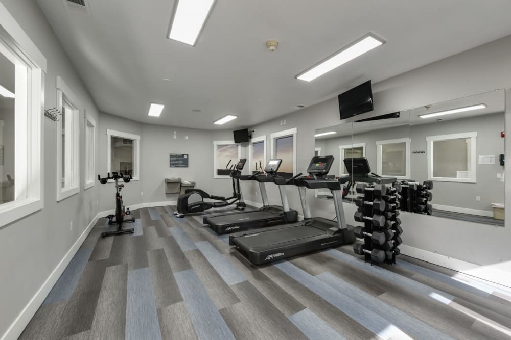 Fitness center with plenty of individual workout stations at The Landings at Morrison Apartments in Gresham, Oregon