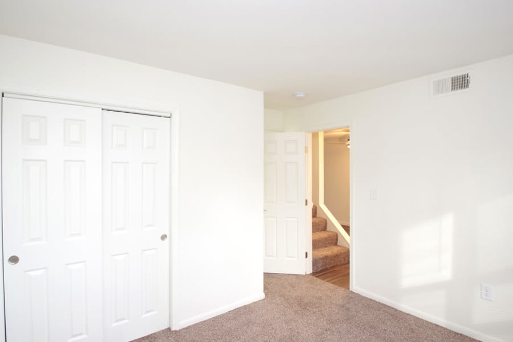 Master bedroom with a spacious closet at Old Mill Townhomes in Lynchburg, Virginia