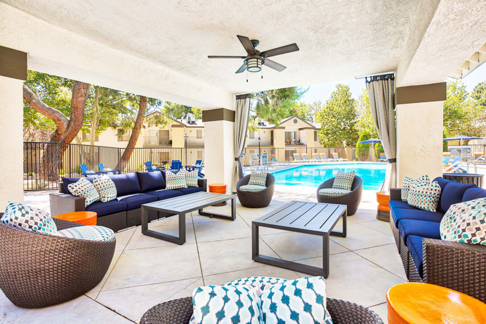 Covered cabana-style lounge area near the swimming pool at Mountain Vista in Victorville, California 