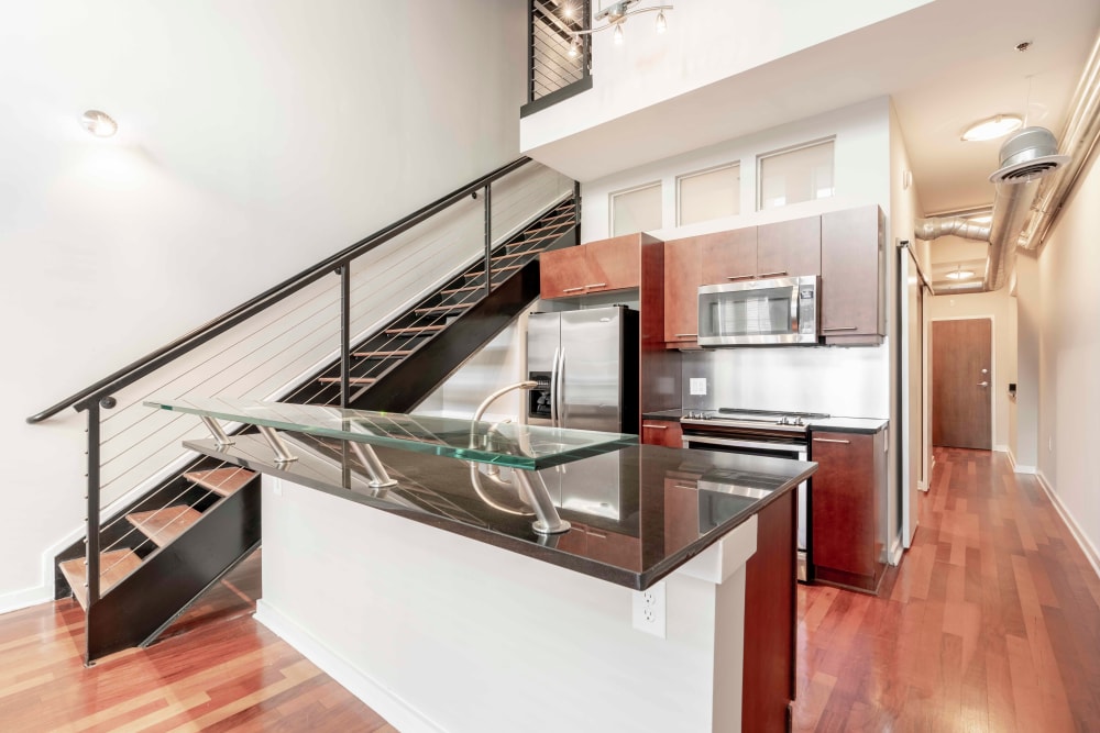 Spacious open concept dining and living room area at 17th Street Lofts in Atlanta, Georgia